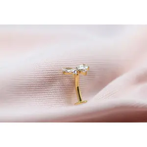 Titanium Gold Bow Threadless Push In Belly Ring Piercing.