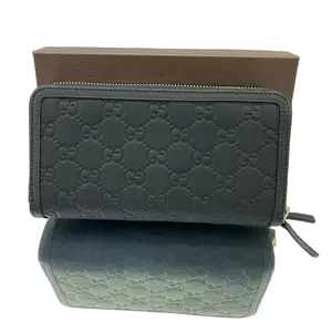Pre-owned leather Clutches & Wristlets Gucci Signature Zip Around Wallet – Black Debossed Guccissima Leather