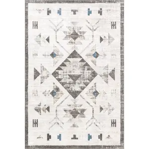 Irini Faded Southwestern Machine Washable Area Rug