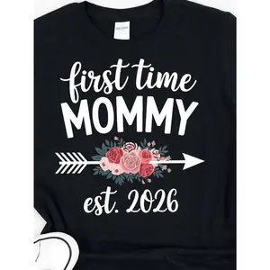 Women's First Time Mommy Est. 2026 Pregnancy Announcement T-Shirt - 100% Cotton Funny Mom-to-Be Gift with Floral & Footprint Design, Casual Round Neck Tee for Maternity Photos & Casual Attire, All-Season Comfort Fit, Crewneck Black Womenswear Tops