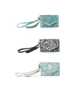 Hand tooled wristlet wallet by Myra