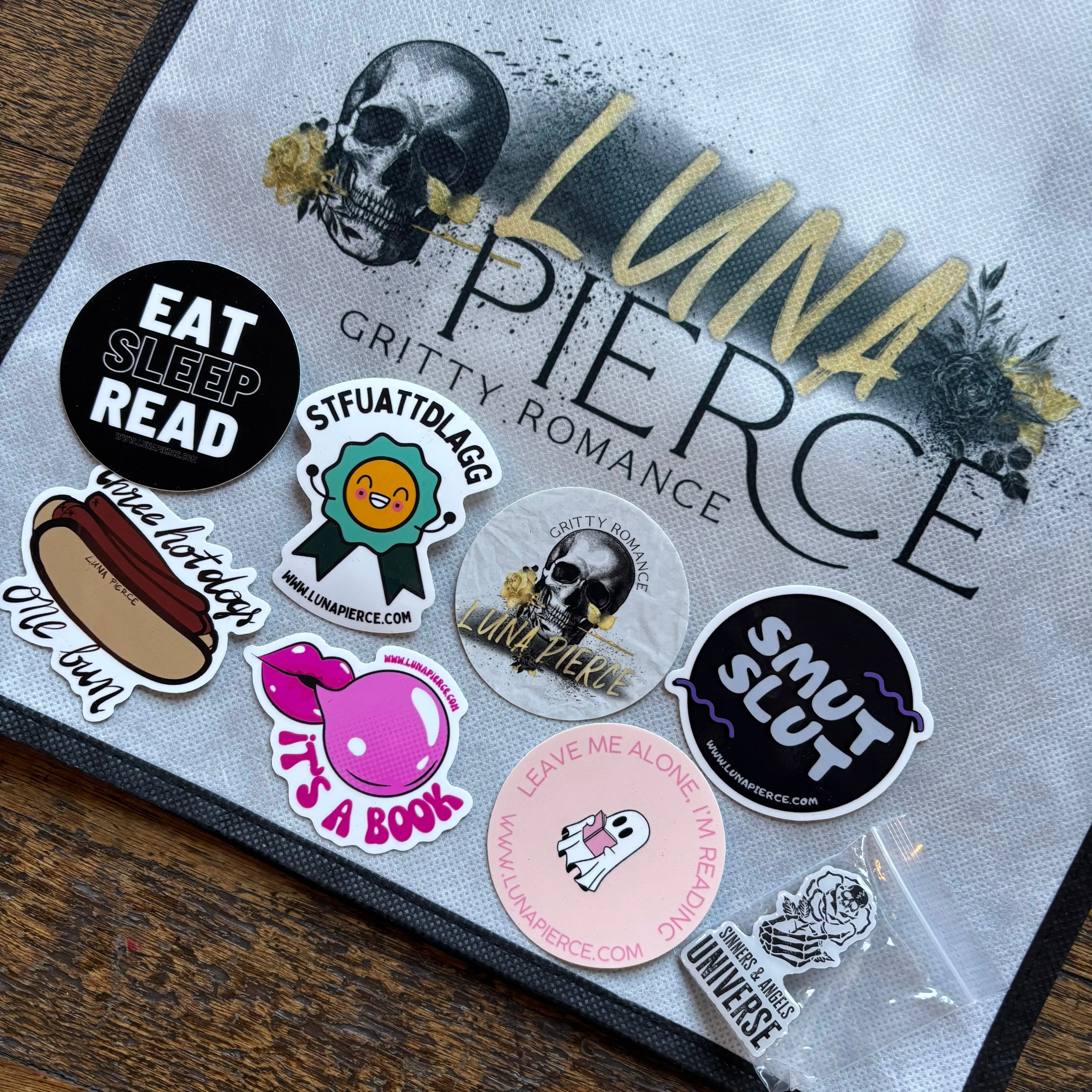 LUNA PIERCE TOTE BAG-PIN-STICKER PACK (SEVEN 2.5" stickers) LUNA PIERCE TOTE BAG-PIN-STICKER PACK (SEVEN 2.5" stickers)