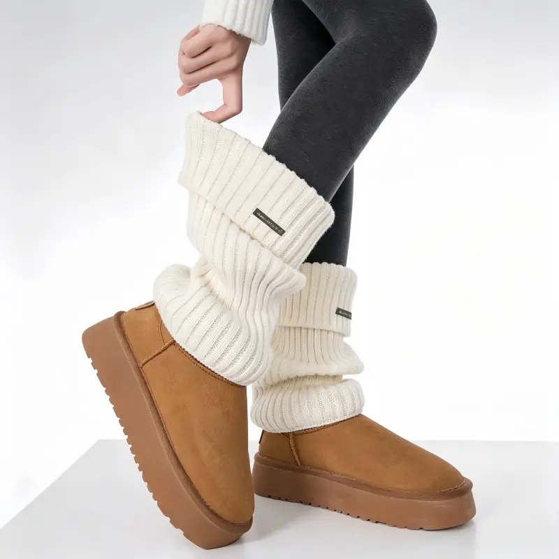 Women's basic solid-color, stretchy, soft jacquard leg warmers with metallic label details; minimalist, stylish, and casual leg warmers that offer a snug fit and warmth—the perfect accessory for your calves.