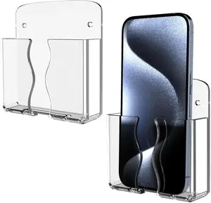 Wall Mounted Phone Holder, Clear Phone Stand Self Adhesive with Charging Hole Compatible with iPhone and Android Smartphone Cradle Bedside Organizer Remote Control Stand for Home Office 2-Pack