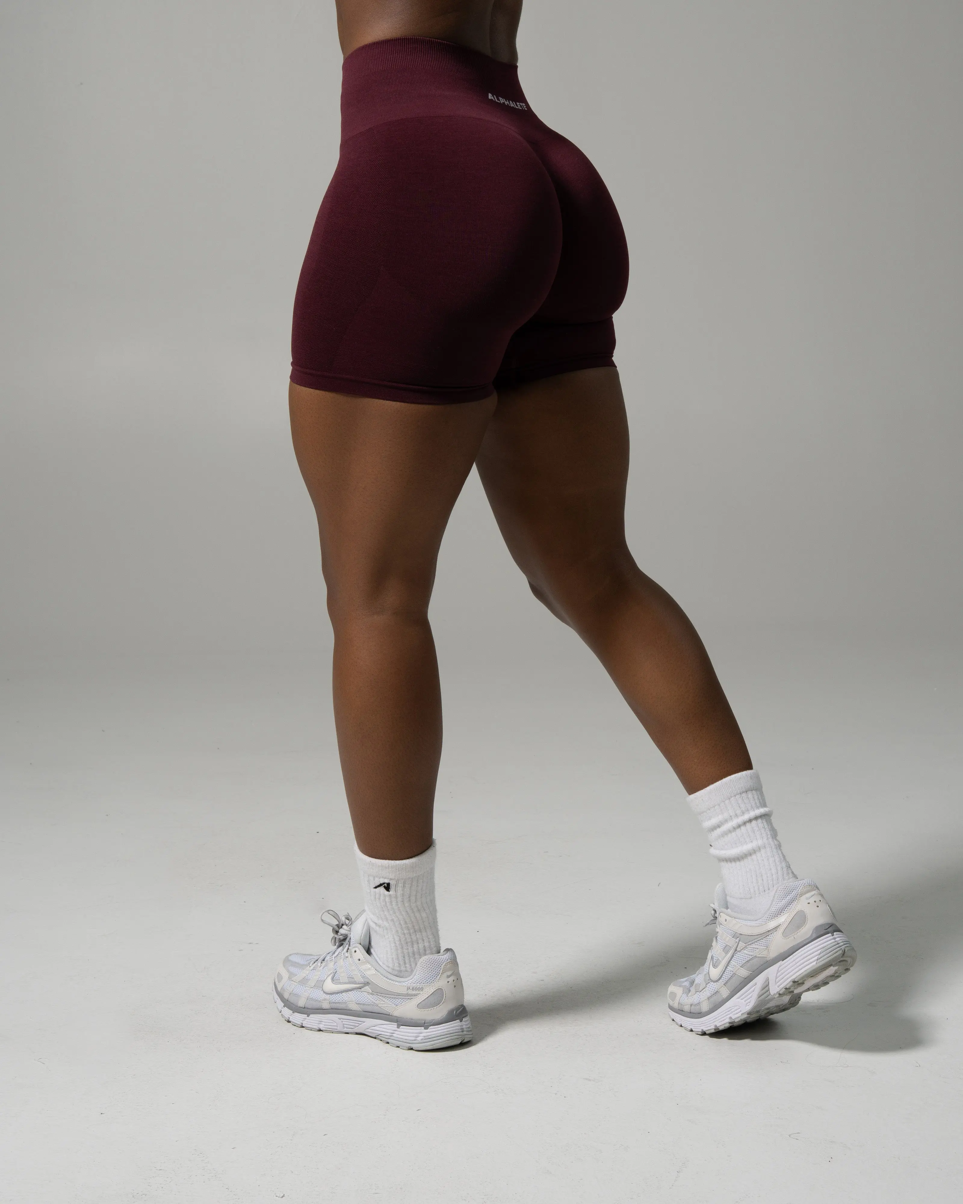 ALPHALETE Sporty Mid-Rise Pump Shorts - Merlot Bottom with Flattering Fit and Comfortable Leg Design