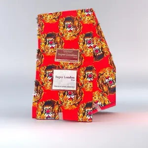 Super London Wax African Tribal Fabric with Bold Lion Head Design in Red Green & Blue Vibrant Colors 44/45 Inches Wide Printed by Super London Wax