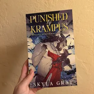 Punished by Krampus: a holiday monster romance novella by Skyla Gray - signed paperback