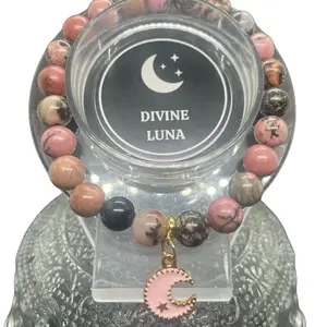 Rhodonite Beads with Pink Moon Charm Bracelet. Message if you need specific size I can adjust.comes in mesh bag and a freebie item.