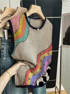 One piece Women's spring/summer relaxed-fit, round-neck sleeveless knitted top, Knitwear, back-to-school casual. Features bold dark blue contrast trim and a patchwork color-block floral print. Ideal for outdoor wear - throw on a vest Womenswear