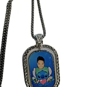 Customizable, double-sided silver rotating charm necklace