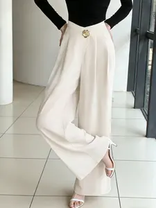 A stylish peach-colored high-waisted wide-leg pants for women, a sleek slim-fit office suit pants, a unique design casual long trousers suitable for all seasons, perfect for home, indoor, and outdoor wear