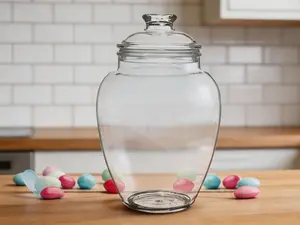 128-ounce clear acrylic apothecary jar with lid, 1 gallon capacity. Ideal for storing candies and cookies, also serves as decorative centerpiece for weddings, kitchen storage and bathroom organization.