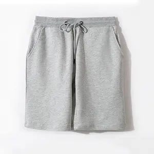 Men's solid color athletic shorts made from 100% cotton, available in multiple colors, suitable for summer wear