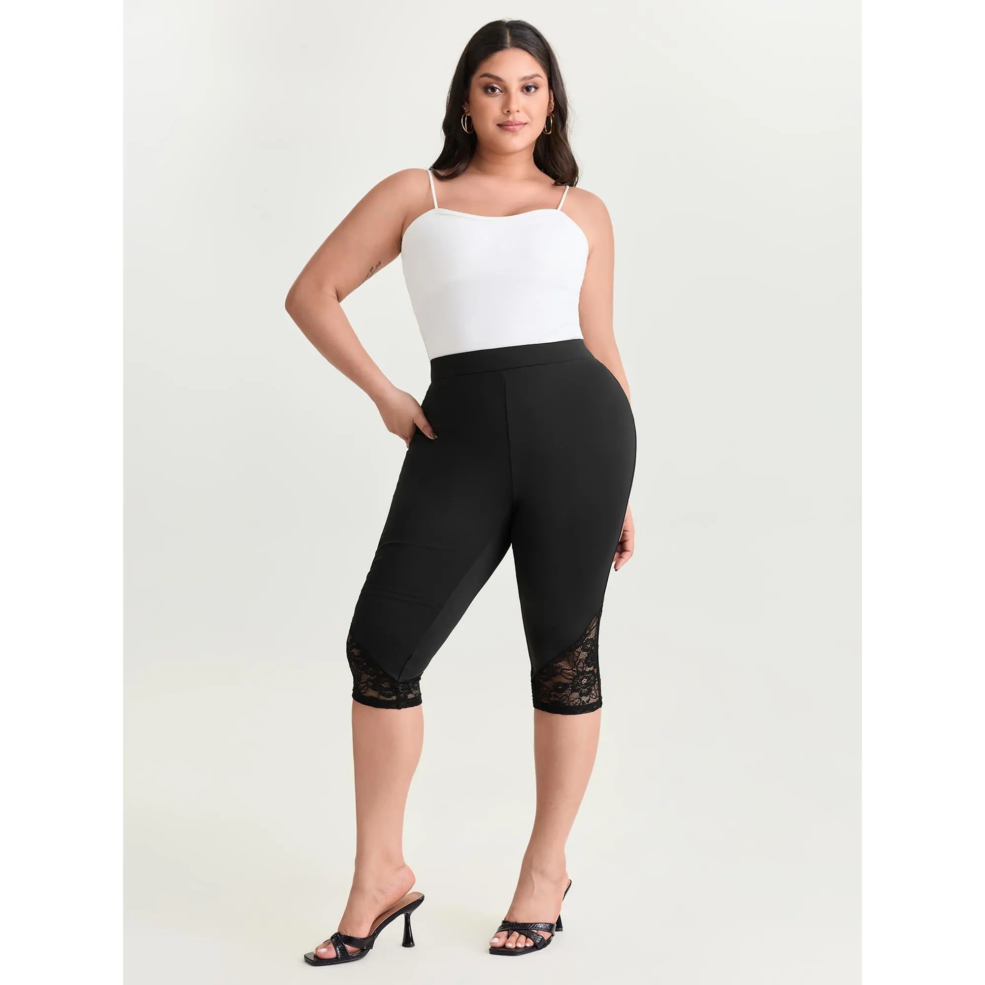 BLOOMCHIC Women’s Plus Size Minimalist Classic Stretch Lace Trim Cropped Leggings (M-6X) - High Stretch Nylon Blend Spandex-Elastane Solid Patchwork Bottom, Breathable, Hand Wash, Casual Everyday Basic, Summerfinds, Comfy, Plain Capri Leggings, High Stret