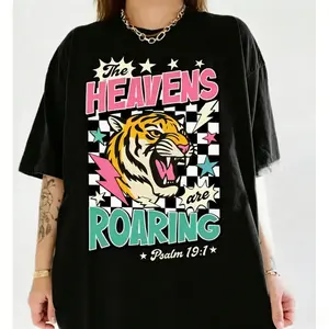 ✨ The Heavens Are Roaring T-Shirt – Bible Verse & Christian Graphic Tee, 80S Faith Shirt, 90S Aesthetic Clothing, Soft Cotton Short Sleeve, Oversized Unisex Casual Streetwear, Y2K Vintage Aesthetic, Daily Wear For Men & Women