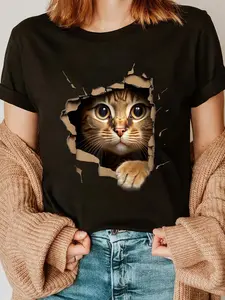 100% Cotton Cute kitten looks from torn fabric - Cats T-Shirt