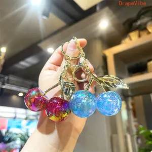Women's Sparkling Pearl Chain Cherry Keychain - Cherry Bag Charm, Bag Charms, Stylish Key Ring Accessory for Daily Use & Gifting (Sports, Fan Shop Merch)