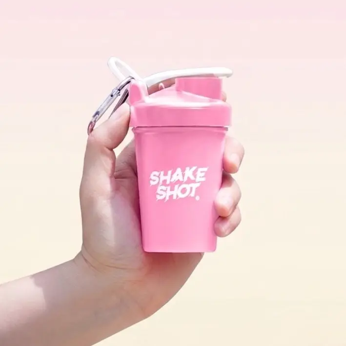 Shake Shot Pink Mini Shaker Bottle - 4 oz Pink BPA-Free Sports Bottle with Shaker Ball Mixer, Carabiner Clip, Portable for Creatine, Gym Bag, Travel, Veteran Owned Pre Workout Cup