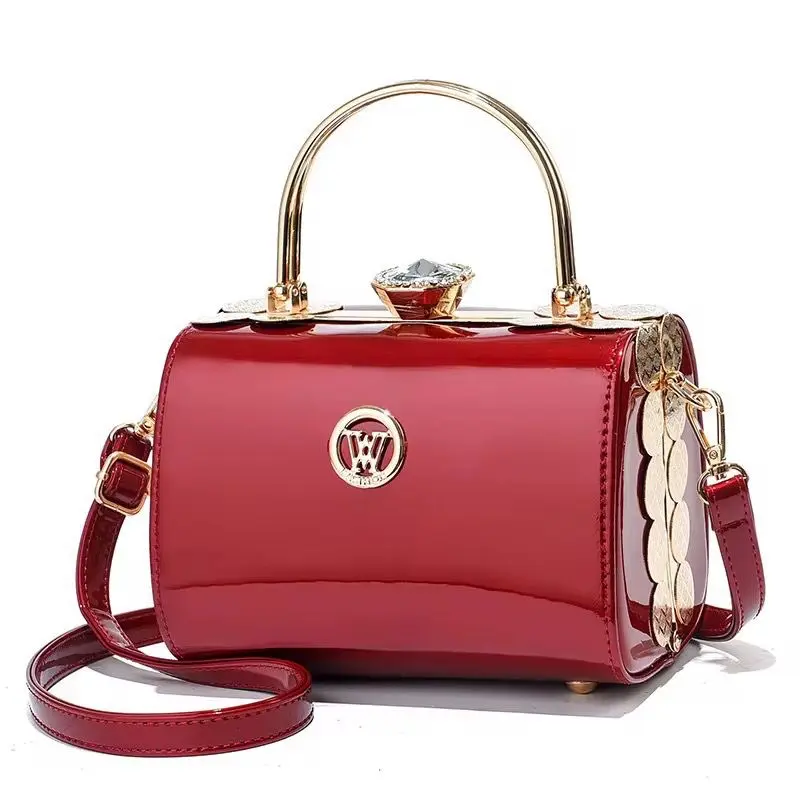 Elegant bag with golden-tone Hardware & crossbody design, durable synthetic, fixed shoulder strap