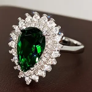 Elegant Synthetic Zirnium Oxide Ring with Emerald-Cut Center Gemstone and Sparkling Embellishments on Copper Band for Women's Jewelry madison bracelet wedding voldemort claddagh small trinkets golden wristband review Personalized Enamel Oil Drop P  longe