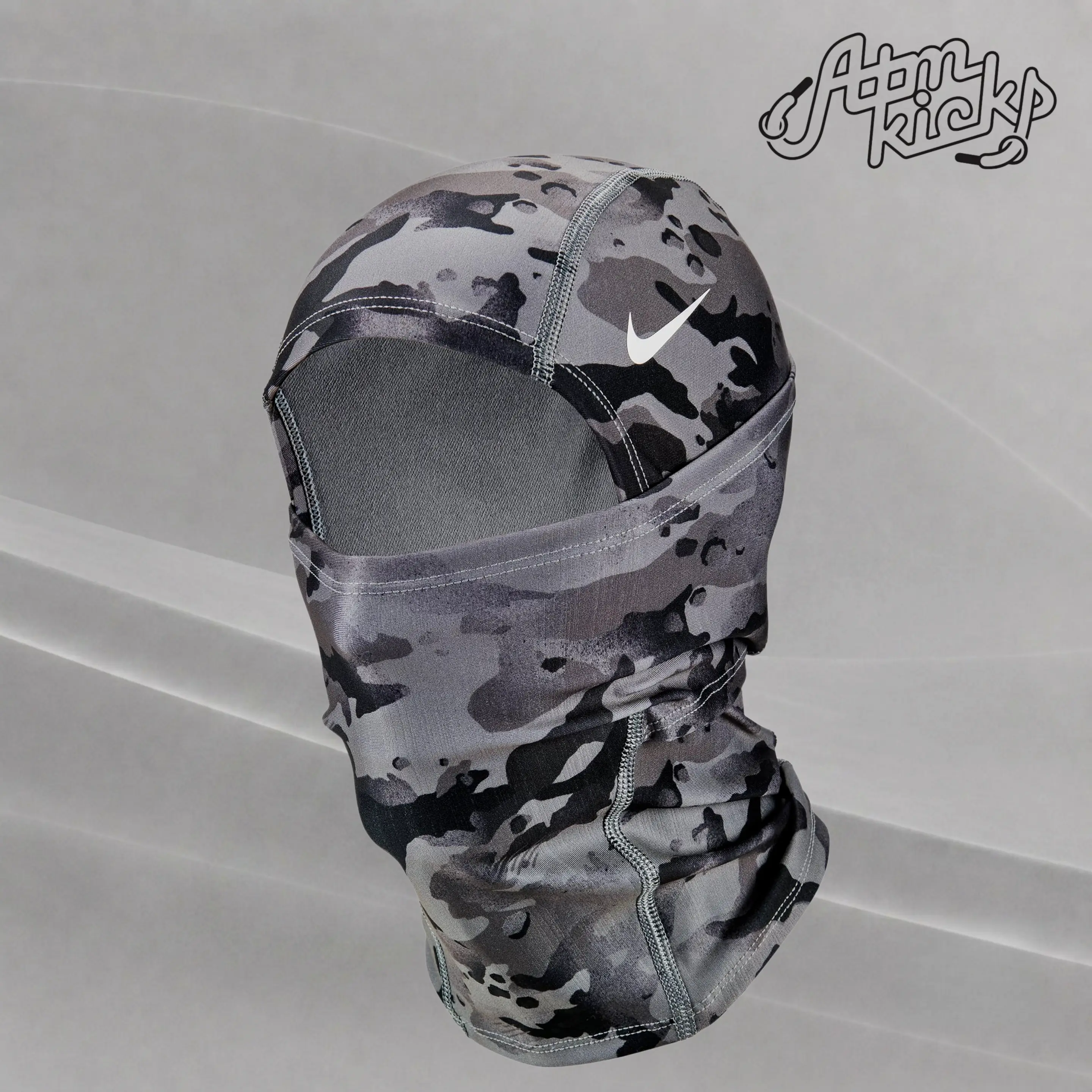 Nike Pro Hyperwarm Hood GreyWindproof and protective face shield gear enhances athletic performance and is suitable for cycling and outdoor sports.