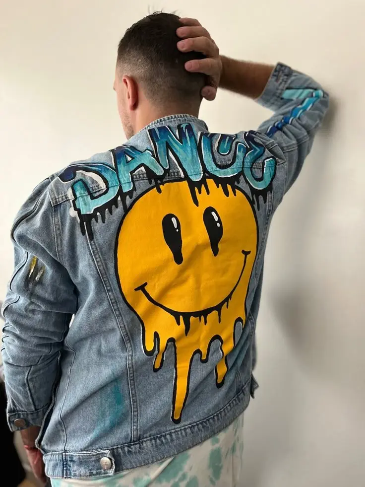 Danger Melting Smiley Face Denim Jacket for Men and Women – Hand-Painted Oversized Jean Jacket with Street Art Graffiti Style – Bold Urban Streetwear Outerwear for Festival and Daily Looks