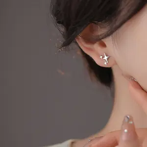 Asymmetrical four-pointed star earrings couple style screw star ear bone nail cross star earrings