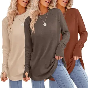 Women's long-sleeved shirt with thumb holes, crew neckline, and curved hem