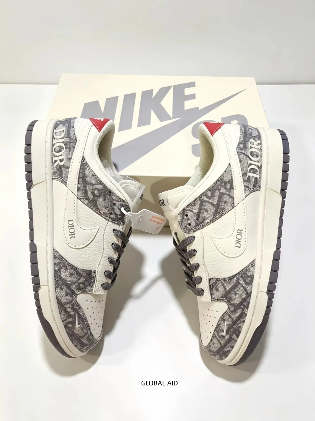 Low-top Sneaker. Premium off-white leather matches vintage grey printed panels. Exquisite color collocation brings retro luxury texture and elevates all casual outfits.