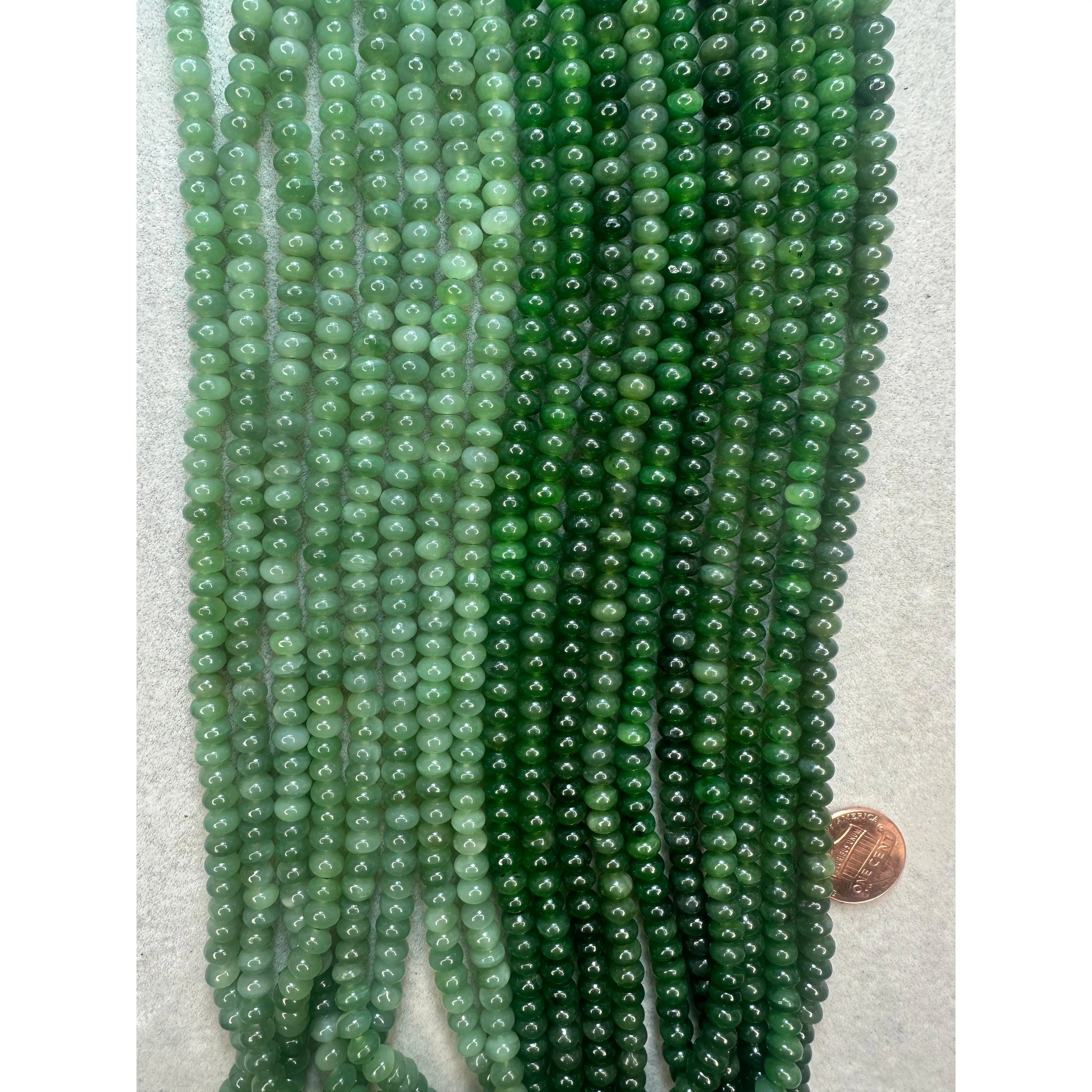 canadian jade 4mmx7mm rondelle AAA grade 16"strand