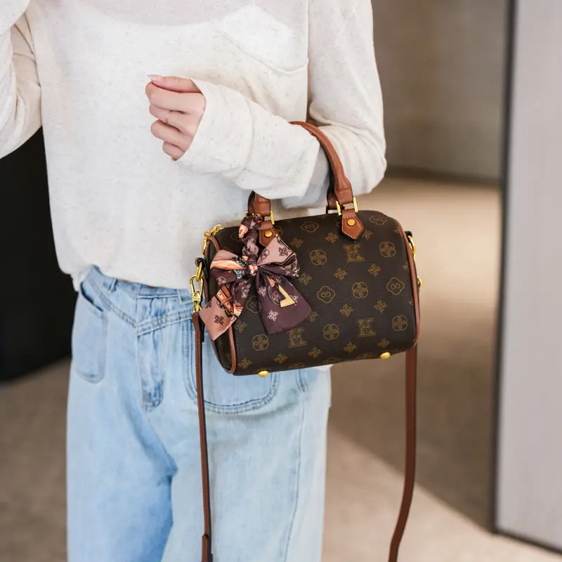 Stylish, versatile, and unique women's bag—chic Boston bag with a premium look, featuring a monogram print and suitable for shoulder or crossbody wear (2026 New Collection)