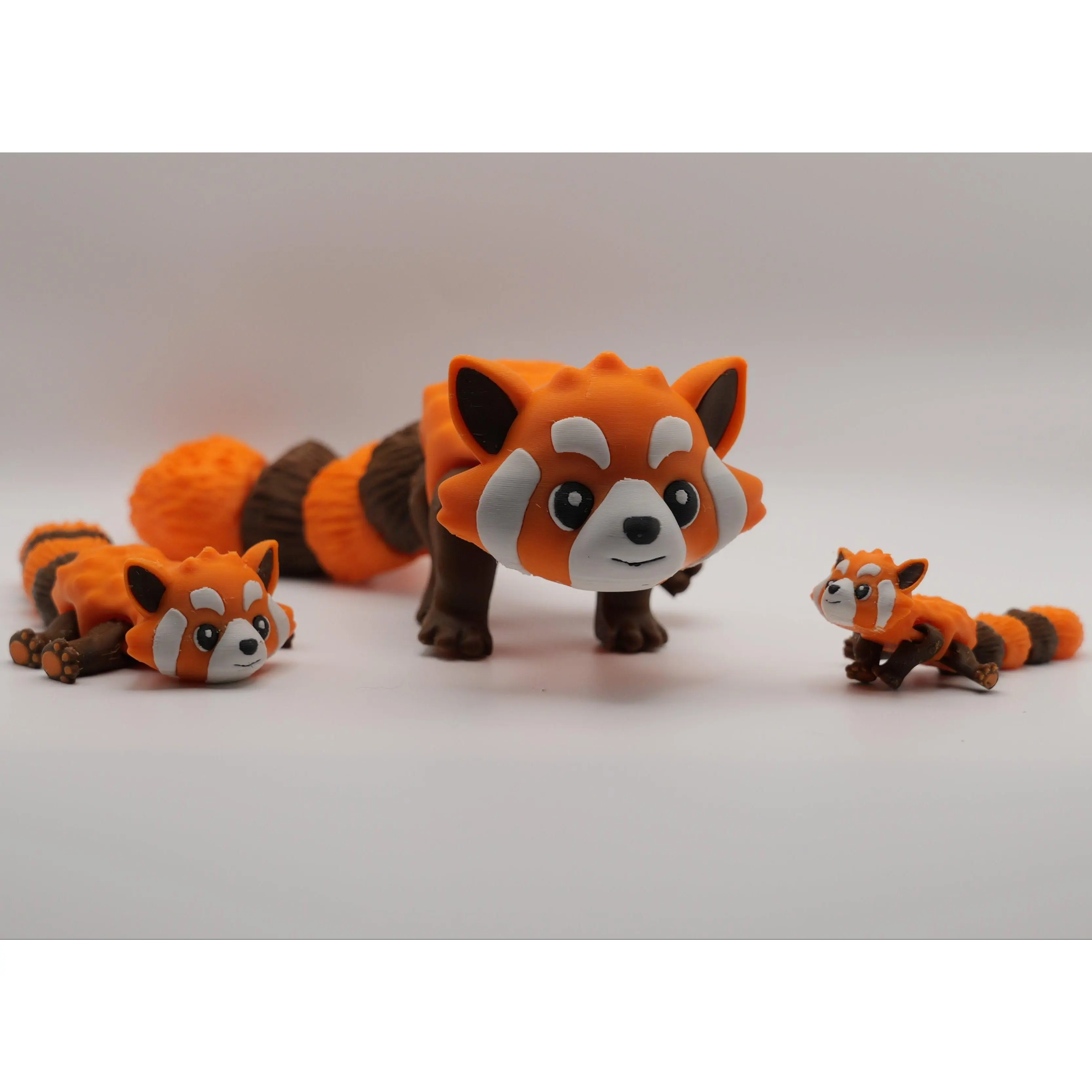 Red Panda – Articulated Flexi Fidget Toy A wiggly 3D printed red panda fidget toy for stress relief and anxiety relief. Cute desk toy made from PLA with smooth flexi movement. Great for collectors and fidget fans. Mini and standard sizes.