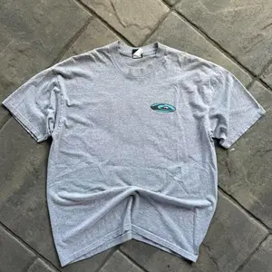 Vintage 90s Quiksilver Grey Surf Graphic Tee Grail Cotton Crewneck Tee for Vintage Coastal Style and Fall Streetwear, Unisex Crewneck Shirt for Men and Women