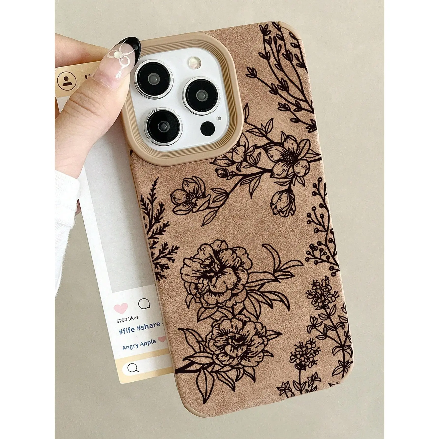 A premium faux leather phone case with a sheep leather texture in brown and hollow-out design, featuring a vintage floral pattern. It is compatible with iPhone 17/16/15/14/13/12/11/X/XS/Xs Max and makes a perfect holiday gift for friends, family, Flower,,