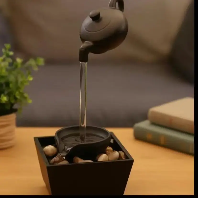 A Zen-themed tea pot fountain decoration, creating a Zen garden landscape, courtyard decoration, fashionable floating fountain for the garden, garden decoration, home decoration, gift for friends and relatives