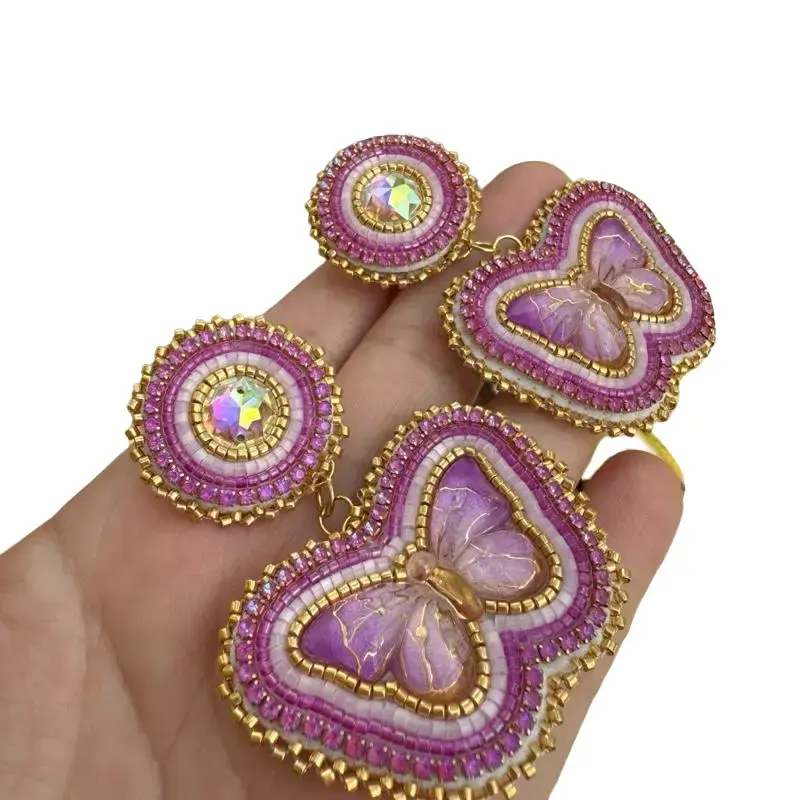 Beautiful Beaded Butterfly Earrings with Gold Accents and Pink Gems for Elegant Fashion