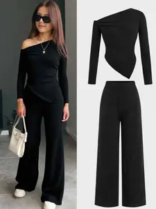 Spring and Autumn New Fashion for Young Girls, Featuring an Elegant and Gentle Ladylike Design. This Exquisite Solid-color Fitted Top Has an Asymmetrical Hem with an Off-shoulder Detail and Long Sleeves. It Pairs Well with Casual Pants in the Same Color