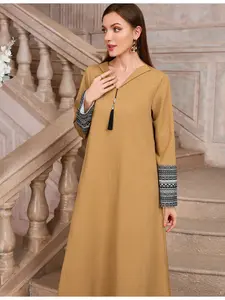 A women's yellow V-neck Long Sleeve tassel embroidered loose-fit slimming elegant robe dress, suitable for commuting, daily wear, Casual Wear and vacation outfits.