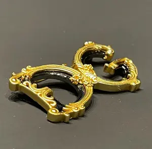 Luxury Designer Brooch with Intricate Gold and Black Design Perfect for Formal and Casual Wear