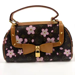 Pre-owned Louis Vuitton leather Top Handle Bags LV with Floral Accents and Gold Metal Details