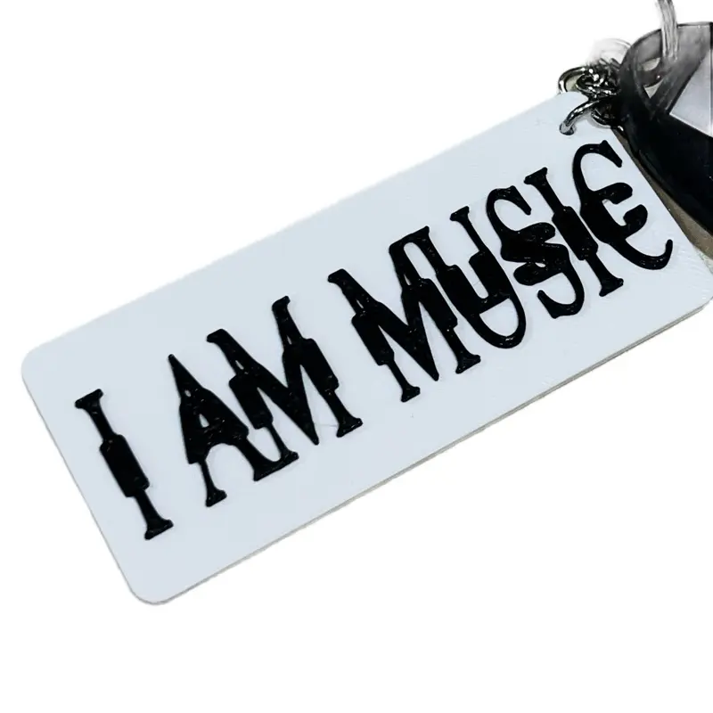 I AM MUSIC Carti Keychain White and Black Bold "I AM MUSIC" Text with Iconic Design for Keys, Bags & More