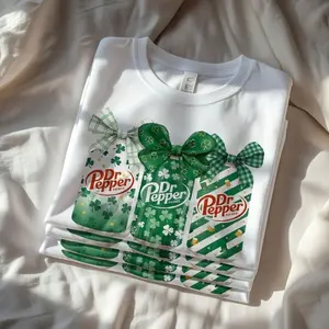 [SALE UP TO 50%] St Patrick’s Day Dr Pepper Sweatshirt / T-Shirt / Hoodie – Cute Shamrock & Green Bow Soda Can Graphic, White Cozy Irish Aesthetic Style, Gift for Dr Pepper Lovers