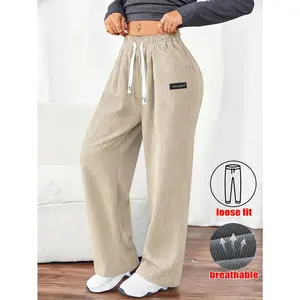 Women's Corduroy Jogger Pants for Spring and Autumn, featuring solid colors with drawstring pockets. Crafted from soft and comfortable fabric, these pants are ideal for everyday casual wear.
