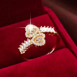 Symmetrical heart shaped gold plated ring with sparkling Cubic Zirconia, jewelry for women to wear everyday and as a gift for wedding, bridal, dating