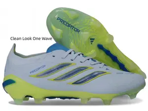 Sleek low-profile football boots with signature side graphic detailing and gradient stud outsole