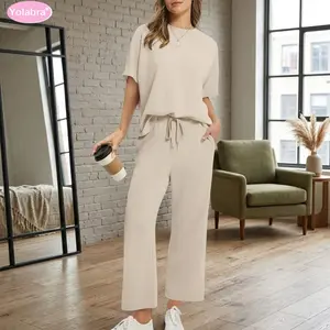 Yolabra Casual Two-Piece Loungewear Set  Soft Lightweight Smooth Fabric Loose Relaxed Drop Shoulder Top  Drawstring Waist Cropped Pants With Practical Side Pockets Minimal Solid Color Matching Suit  Versatile Daily Casual Outfit