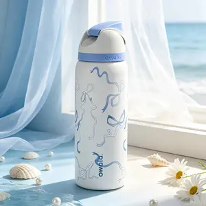 Owala FreeSip 32oz stainless steel sports water bottle features blue ribbon print and is BPA-free, perfect for sports, casual daily use, outdoor adventures and fitness training.