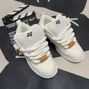 Classic low-top white “bread” sneakers featuring a thick tongue for comfort—trendy casual shoes that are a best-selling unisex model; basic white sneakers for everyday walking and leisure. Footwear Closed