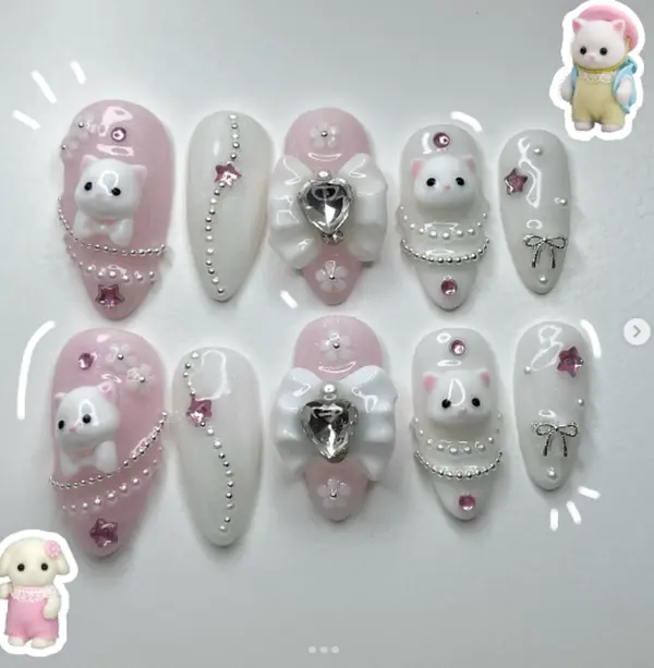 Sweet Silky Bunny Nail Set in pastel pink and white tones with 3D bear charms, pearls, bows, and heart gems—perfect for a soft, dreamy, and princess-core aesthetic.