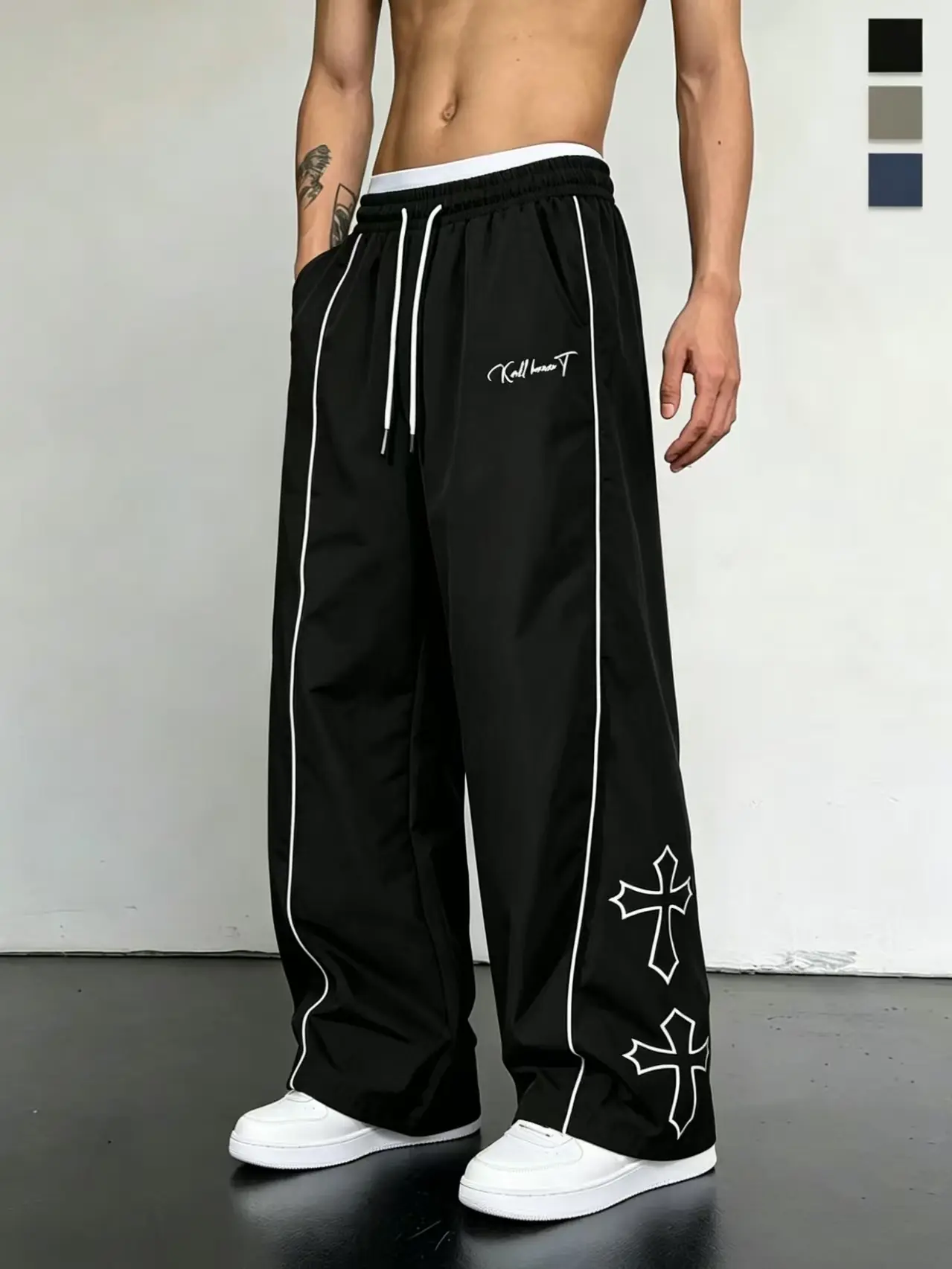 Men’s casual straight-leg pants featuring side stripe letter print and an elastic waistband; suitable for sports and leisure, street fashion style, ideal for dancing and everyday commuting—an essential piece for summer travel outfits.